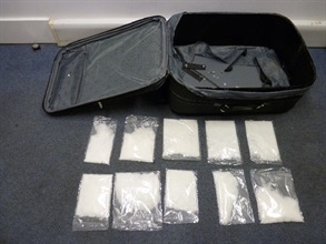 The Customs seized about two kilogrammes of methamphetamine hidden inside a false compartment of a suitcase.