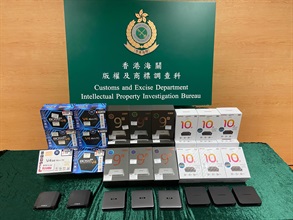 Hong Kong Customs today (June 12) conducted an enforcement operation to combat infringement activities involving unauthorised communication of copyrighted works to the public. Preliminary figures show that about 125 suspected illicit streaming devices and a batch of electronic equipment, with an estimated market value of about $200,000, were involved in the cases. Photo shows some of the suspected illicit streaming devices seized.