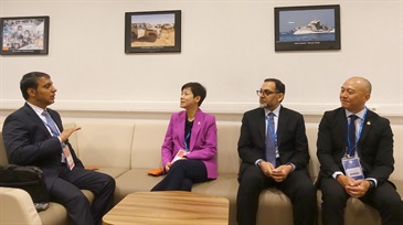 The Commissioner of Customs and Excise, Ms Louise Ho (second left), exchanges views with the Director General of the Federal Authority for Identity, Citizenship, Customs and Port Security of the United Arab Emirates, Mr Ahmed Abdullah Bin Lahej Al Falasi (first left), during the 143rd/144th Sessions of the Customs Co-operation Council of the World Customs Organization.