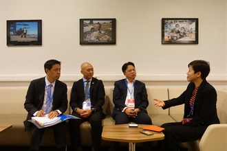 The Commissioner of Customs and Excise, Ms Louise Ho (first right), exchanges views with the Director General of the Thai Customs Department, Mr Theeraj Athanavanich (second right), during the 143rd/144th Sessions of the Customs Co-operation Council of the World Customs Organization.