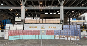 Hong Kong Customs mounted a territory-wide enforcement operation codenamed "Thunder" over the past two months to combat illicit cigarette telephone-ordering activities in public rental housing. On September 2, Customs detected two large-scale illicit cigarette cases. A total of about 18.2 million suspected illicit cigarettes and 740 kilograms of suspected duty-not-paid manufactured tobacco, with a total estimated market value of about $86.6 million and a duty potential of about $63.1 million, were seized. Photo shows the suspected illicit cigarettes and suspected duty-not-paid manufactured tobacco seized.