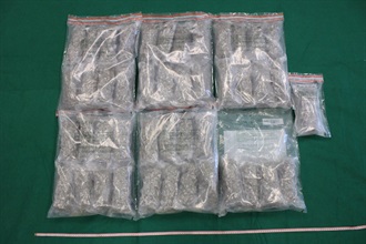 Hong Kong Customs detected two dangerous drugs cases in Yau Tong and Hong Kong International Airport yesterday (September 12) and seized a total of about 27 kilograms of suspected cannabis buds with an estimated market value of about $7.7 million. Photo shows the suspected cannabis buds seized in the second case.