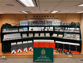 Hong Kong Customs combats counterfeit goods activities during the Double 11 Festival shopping period and seizes 3.25 million suspected counterfeit goods with a total estimated market value of over $90 million. Photo shows the suspected counterfeit goods seized.