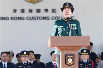 The Commissioner of Customs and Excise, Ms Louise Ho, delivers a speech at the Hong Kong Customs Passing-out Parade today (December 17).