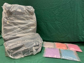 Hong Kong Customs mounted anti-narcotics operations to combat drug trafficking activities through air cargo and passenger channels at Hong Kong International Airport from November to December 16. During the operations, a total of 83 drug cases were detected, and about 373 kilograms of drugs, including cannabis, methamphetamine, ketamine and cocaine, with an estimated market value of more than $160 million, were seized. Photo shows some of the suspected MDMA concealed in a car safety seat.